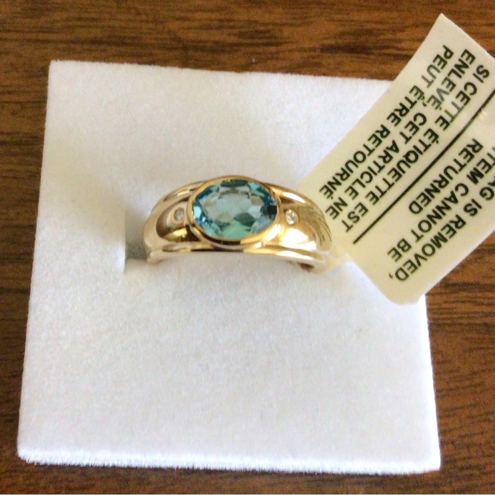 Sterling Silver Blue Topaz Ring with Diamond Accents